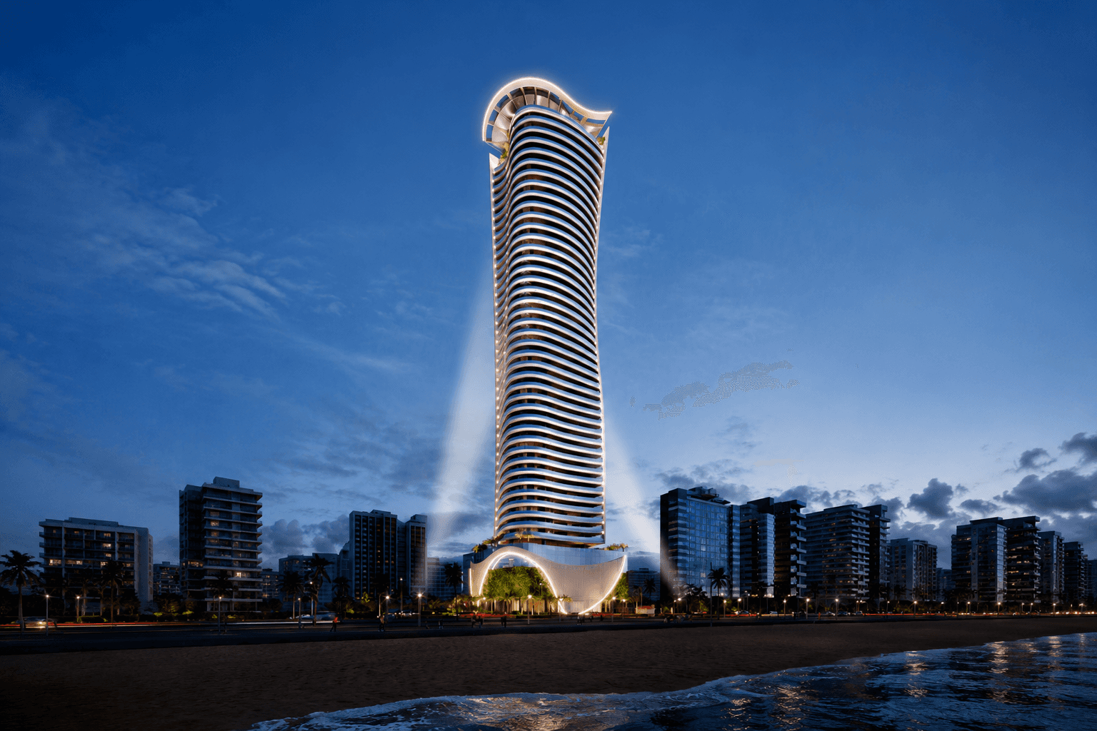Fachada noturna do Ivens com volumetria curvilínea iluminada